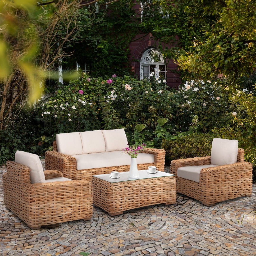 Garden furniture of the wicker type. Sofas and garden chairs made of wicker.
